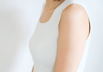 体調の悪い女性